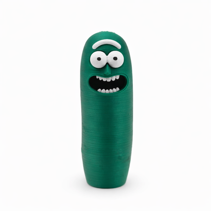 Case para isqueiro verde estilo cartoon com olhos salientes e sorriso exagerado, design coleccionável e acabamento detalhado.