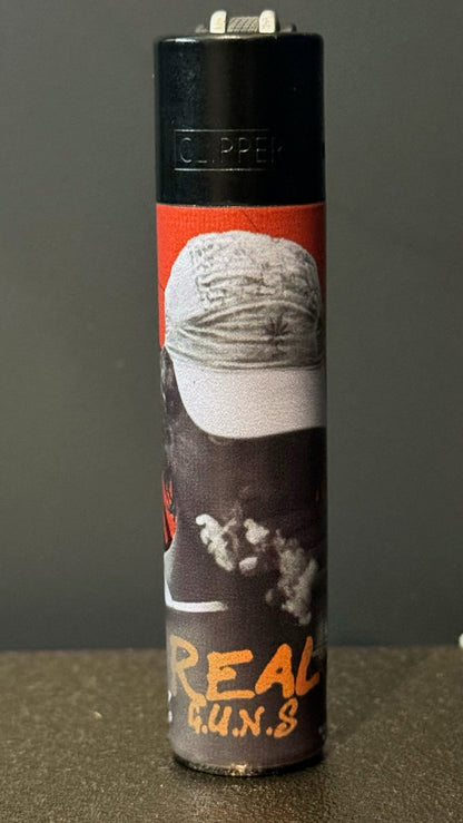 Clipper edição limitada Tropical Bud x The Real Guns com design tropical, inspirado no rapper crioulo.

